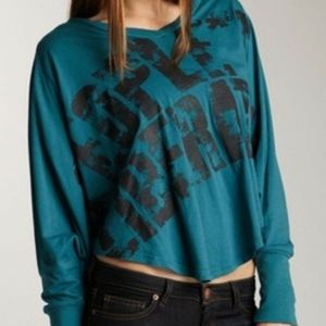 Hi low teal poncho peoples liberation T-shirt top
